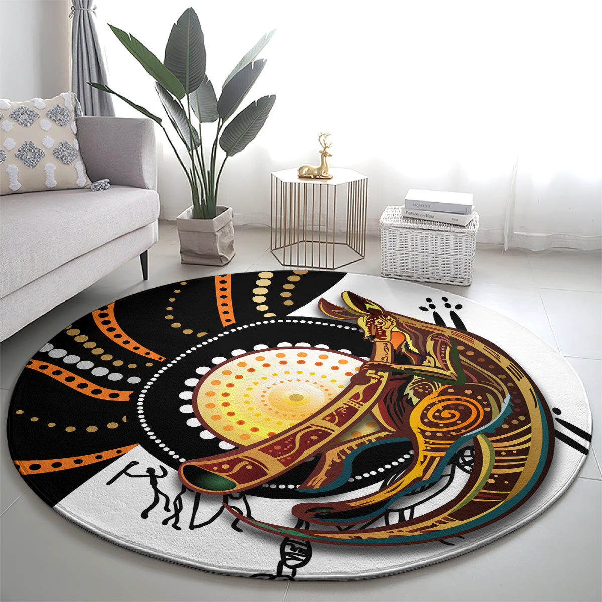 Round rug with Aboriginal-inspired kangaroo and dot patterns in black, orange, and green trim