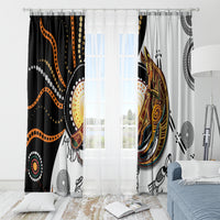 Aboriginal dot-pattern window curtains with kangaroo graphic, hanging on top rod rings
