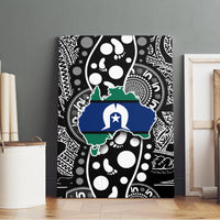 Canvas wall art featuring a blue island map with white star and green outline on black patterns