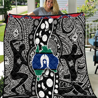 Aboriginal pattern quilt with bold black-and-white tribal print, blue star and green map design
