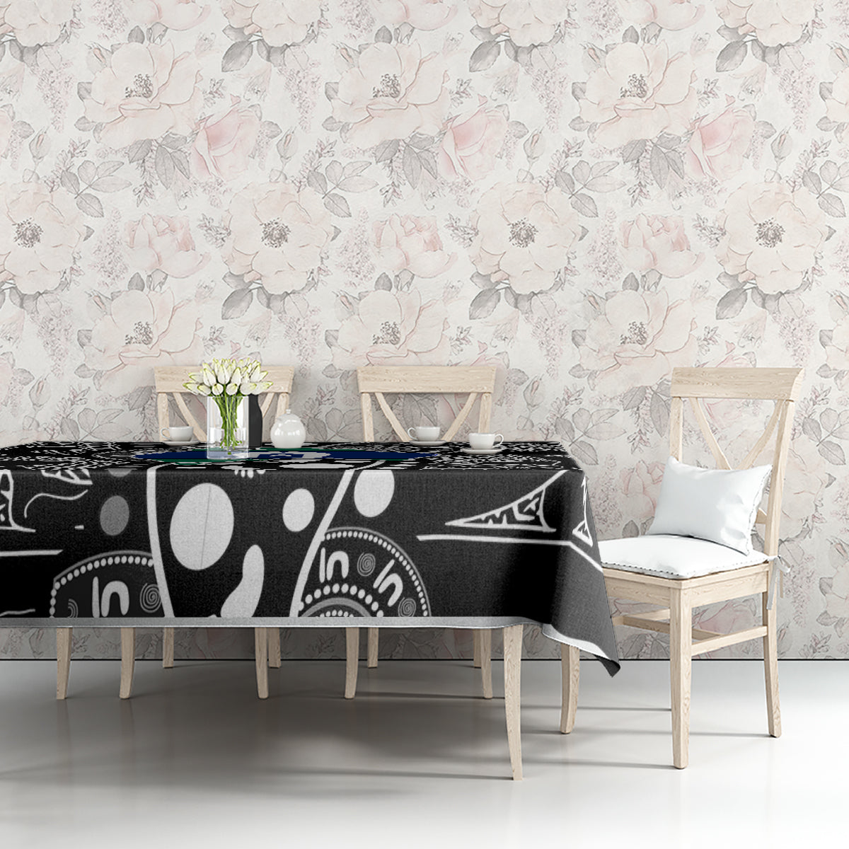 Aboriginal patterned tablecloth, black with white motifs and blue-green abstract design
