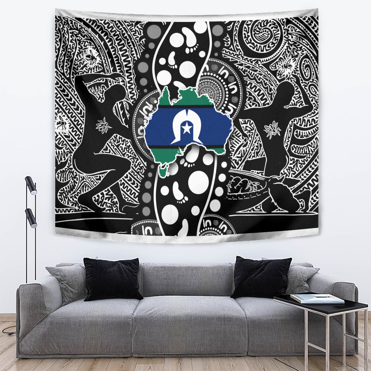 Wall tapestry with black-and-white illustrated figures and central blue-and-green emblem