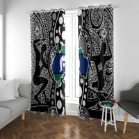 Pair of black and white Aboriginal pattern curtains with blue-and-green map panel