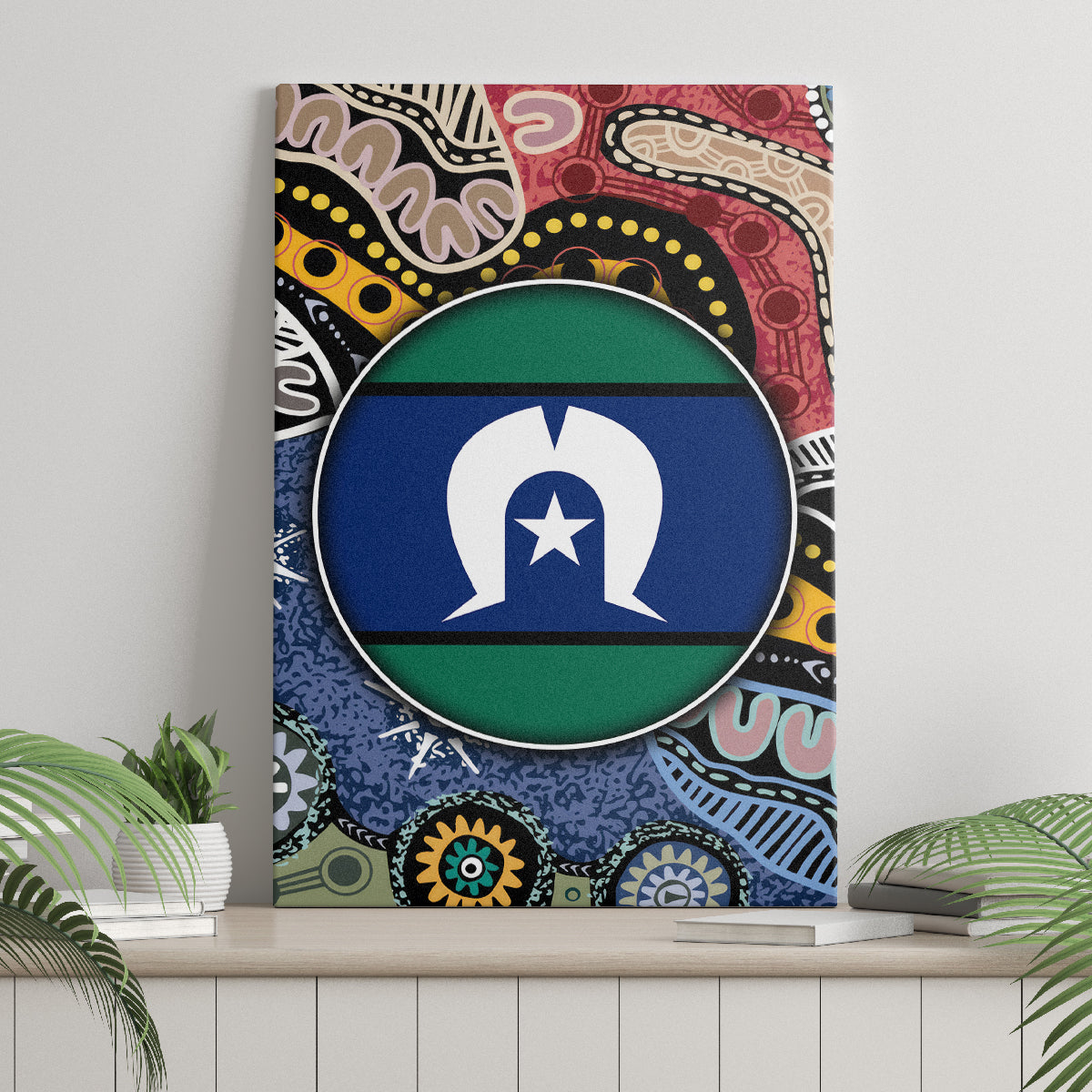 Multicolor Aboriginal patterned canvas wall art featuring a circular blue-and-green emblem.