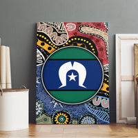 Multicolor Aboriginal patterned canvas wall art with circular blue-and-green emblem, front view.