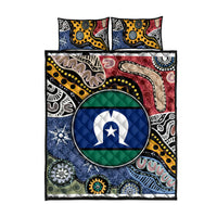 Quilt bed set with Aboriginal-style patterns, circular flag emblem, and two matching pillowcases