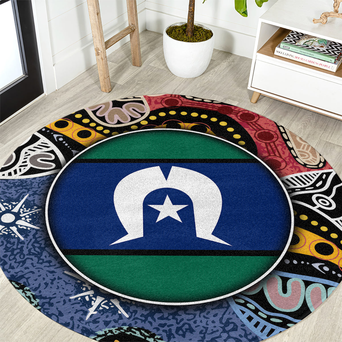Round area rug with central flag-style emblem, blue and green, and multicolor border pattern