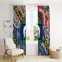Window dressed with multicolor Aboriginal curtains featuring circular blue-green emblem