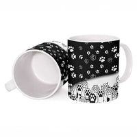 Judging You Silently Ceramic Mug Black Cat Playful Monochrome Paw Print