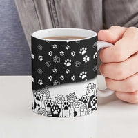 Judging You Silently Ceramic Mug Black Cat Playful Monochrome Paw Print