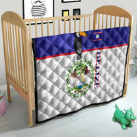 Blue and white baby quilt for crib with toucan, Belize emblem, and flag stripe bands