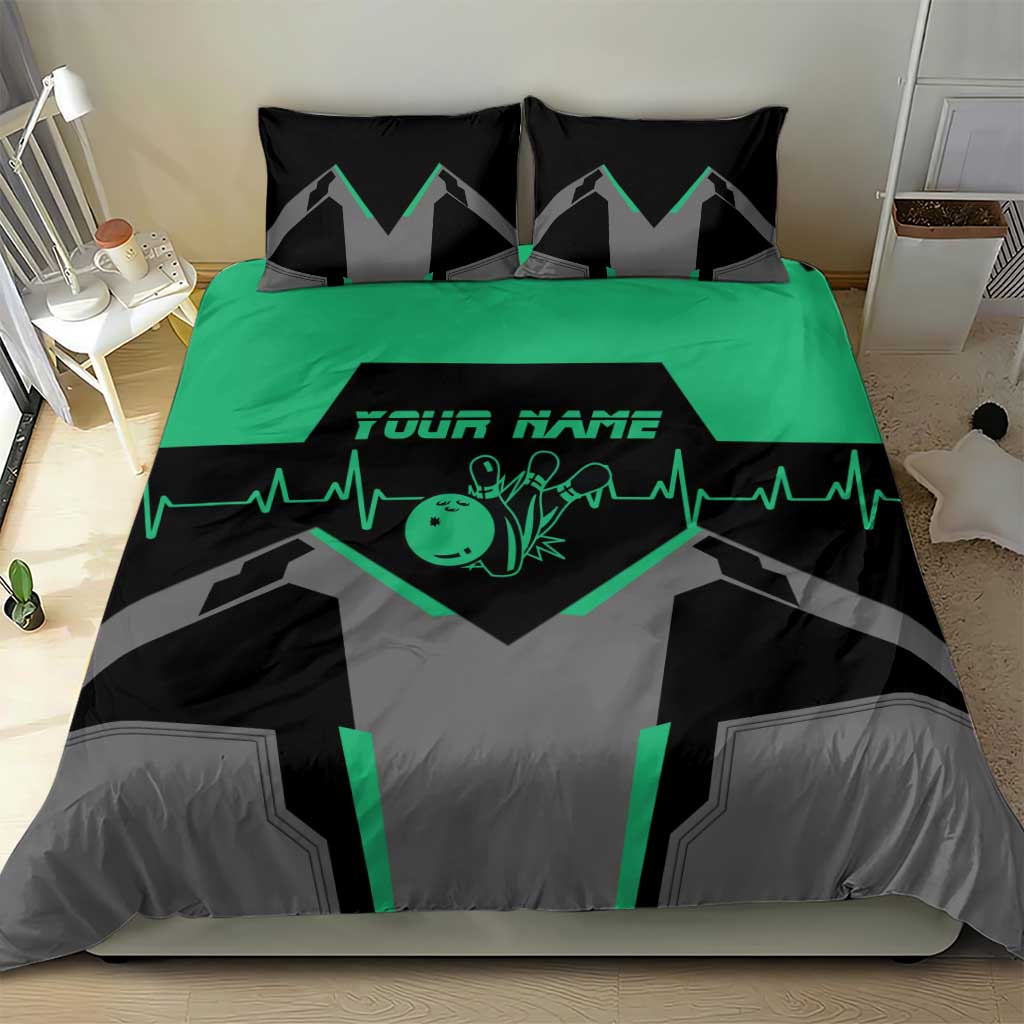 Bowling heart bedding set with green heartbeat graphic on black and gray duvet and pillows