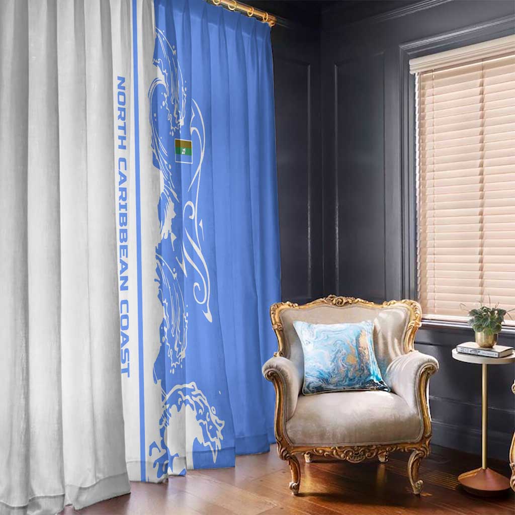 Blue and white wave-pattern window curtains in two hanging panels with vertical print.