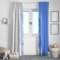 Blue and white ocean wave window curtains, each panel with a decorative wave print.