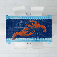 Blue tablecloth with red crab and coral reef ocean wave pattern, scalloped edges