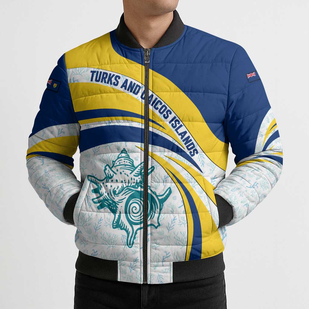 Navy and yellow puffer bomber jacket with full-zip front and sea creature graphic panel.