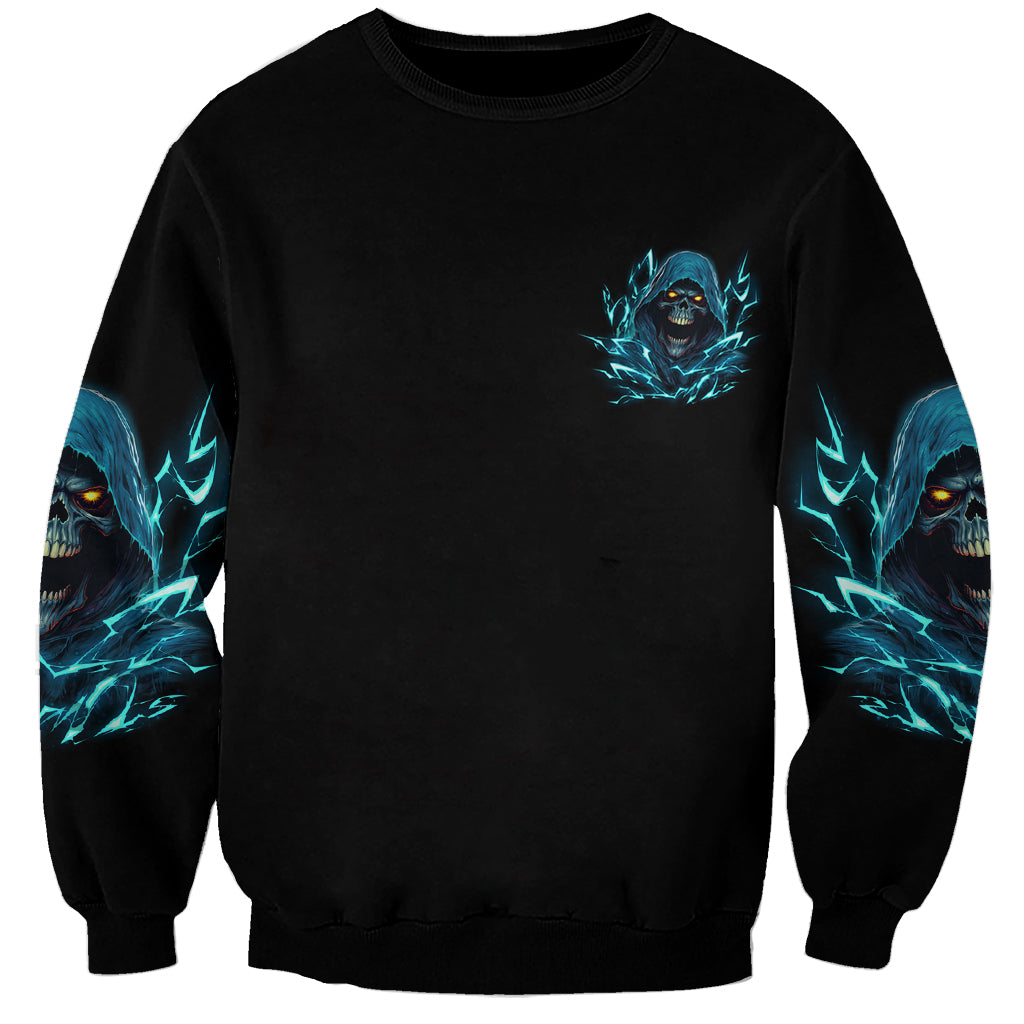 Black crewneck sweatshirt with small blue skull emblem and blue sleeve graphics