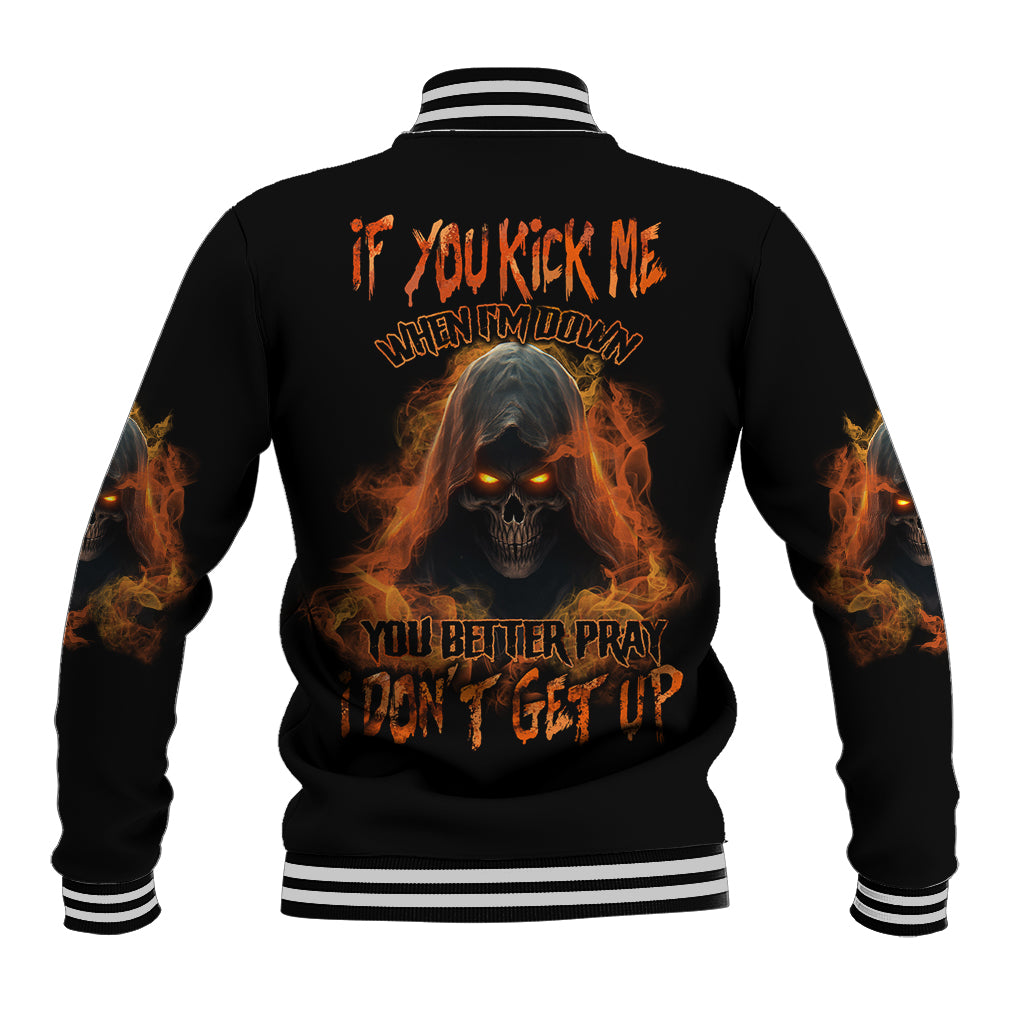 Black baseball jacket with striped ribbed collar, flames skull graphic on back