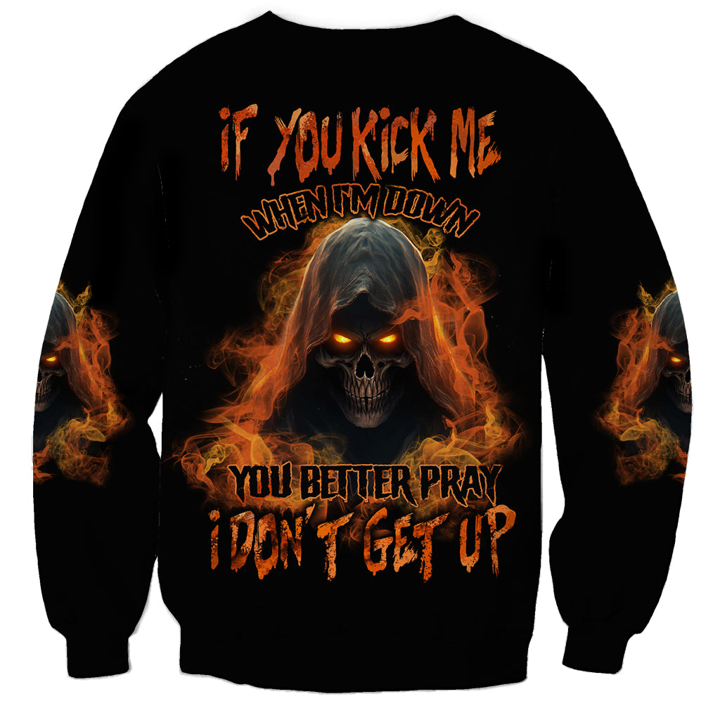 Black unisex sweatshirt with fiery skull graphic and bold orange text