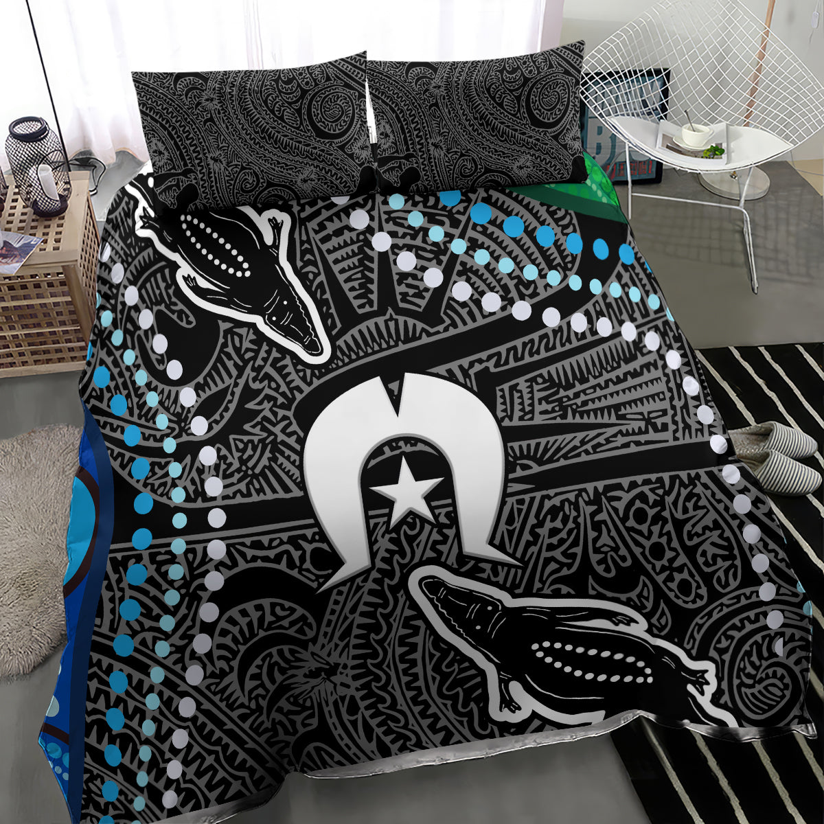 Close-up crocodile print comforter with blue dot trim and large star emblem panel