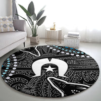 Round black carpet with white/gray tribal graphic center and light blue accent details