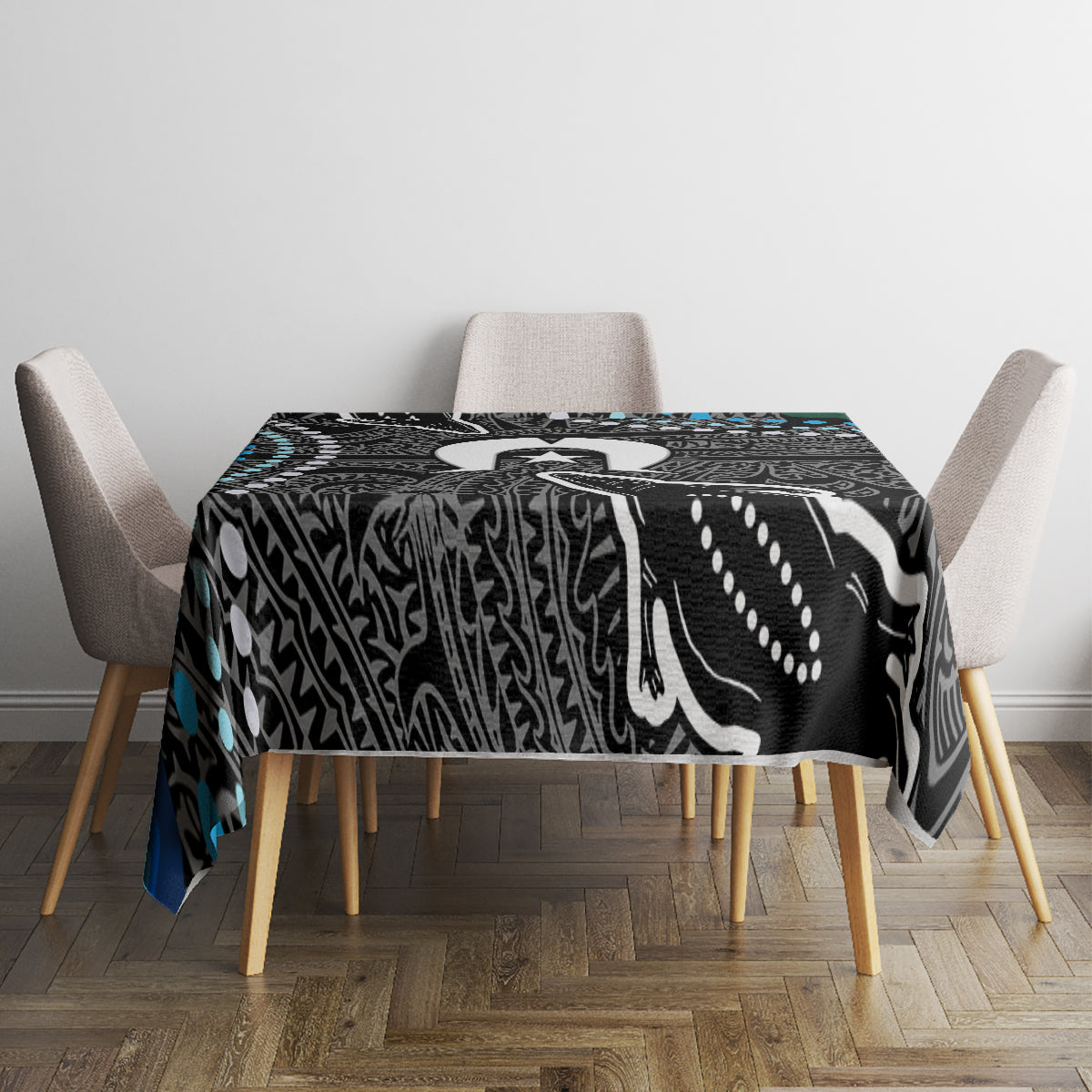 Black, white and teal patterned tablecloth with geometric Aboriginal-inspired artwork.