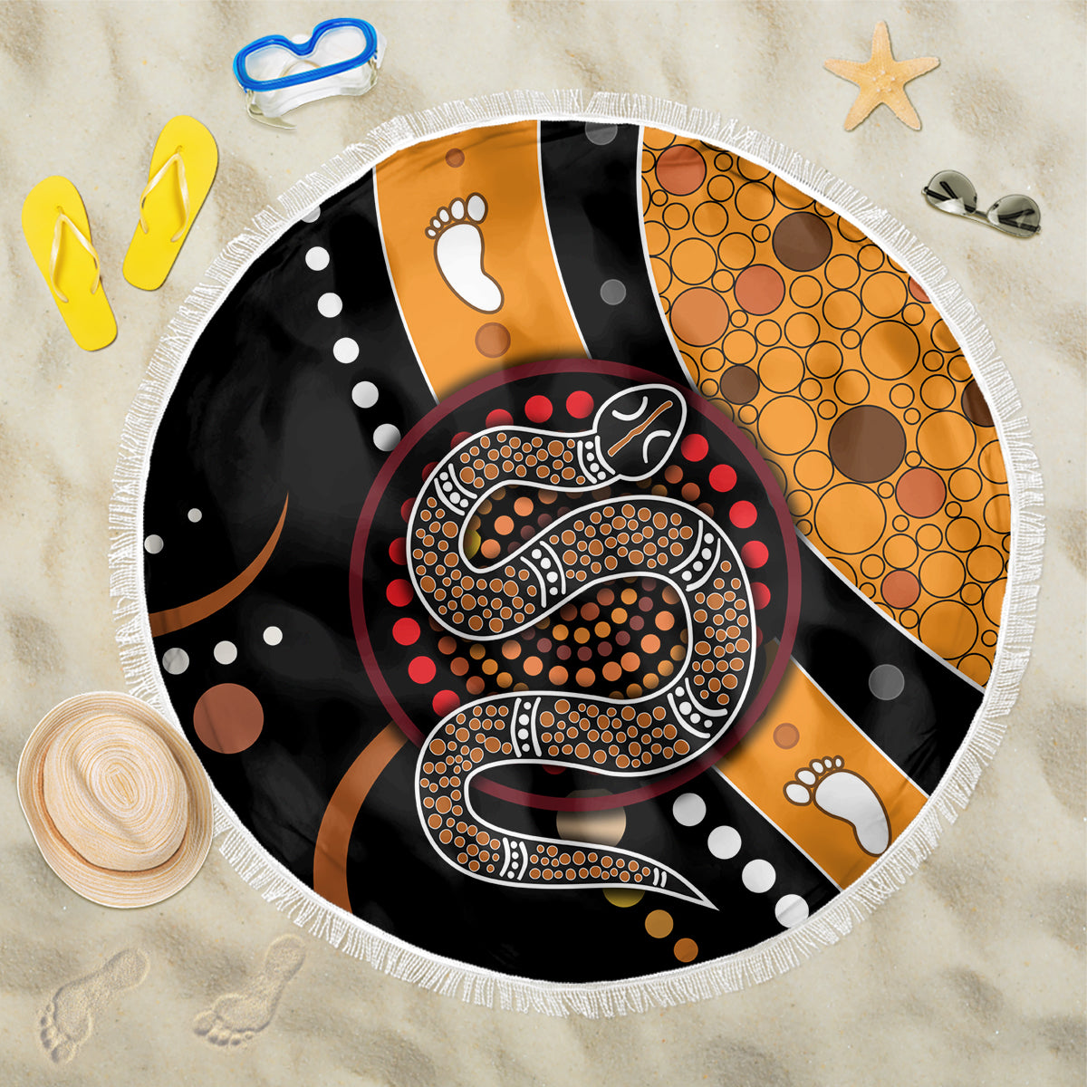 Round beach blanket with fringed edge, black and orange Aboriginal snake dot art