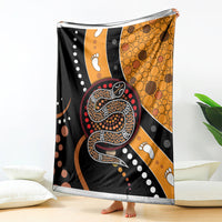 Multicolor snake dot art blanket with orange circular dot section and paw accents.