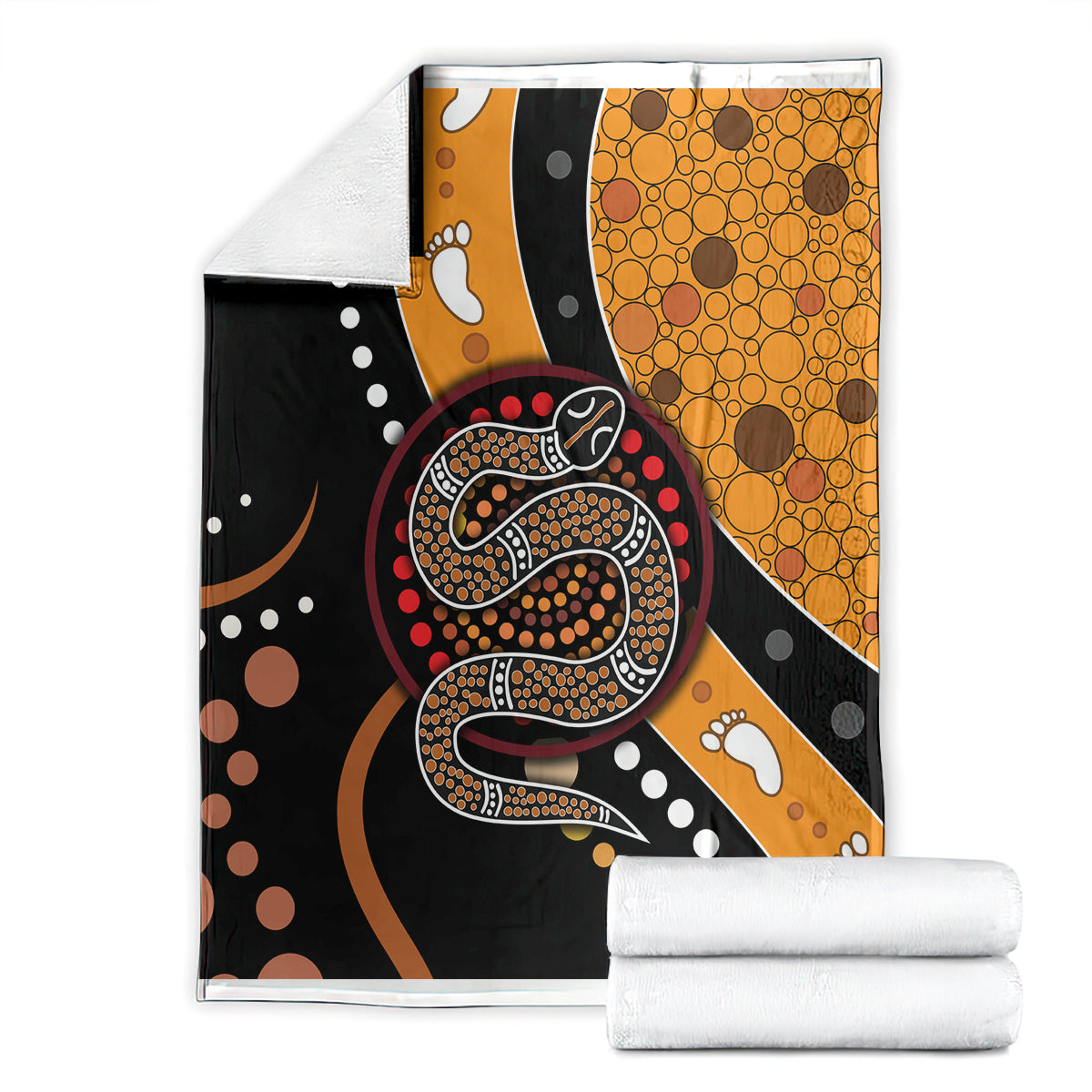 Multicolor snake dot art blanket folded with white stacks of fabric beside it.