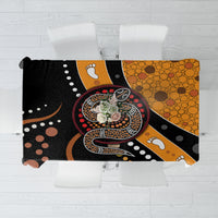 Multicolor snake dot art tablecloth, folded panels with black, orange, and paw print dots