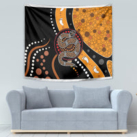 Multicolor snake-pattern dot art tapestry with coiled serpent, orange circles, and white paw prints.