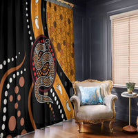 Multicolor snake dot window curtains, one black panel and one orange panel with paw motifs