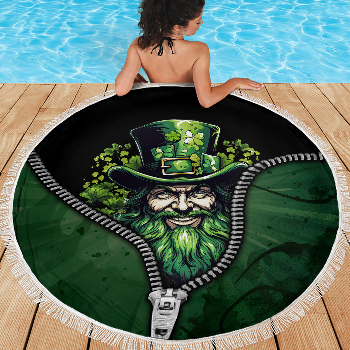 Round beach blanket with white fringe, green leprechaun hat and beard graphic