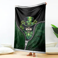 Green zip-art blanket featuring Irish man face in a top hat with zipper-trim border