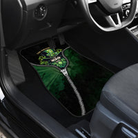 Front car floor mat with green leprechaun zipper graphic and black border