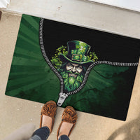 Rubber doormat with green leprechaun face and zipper graphic in dark green