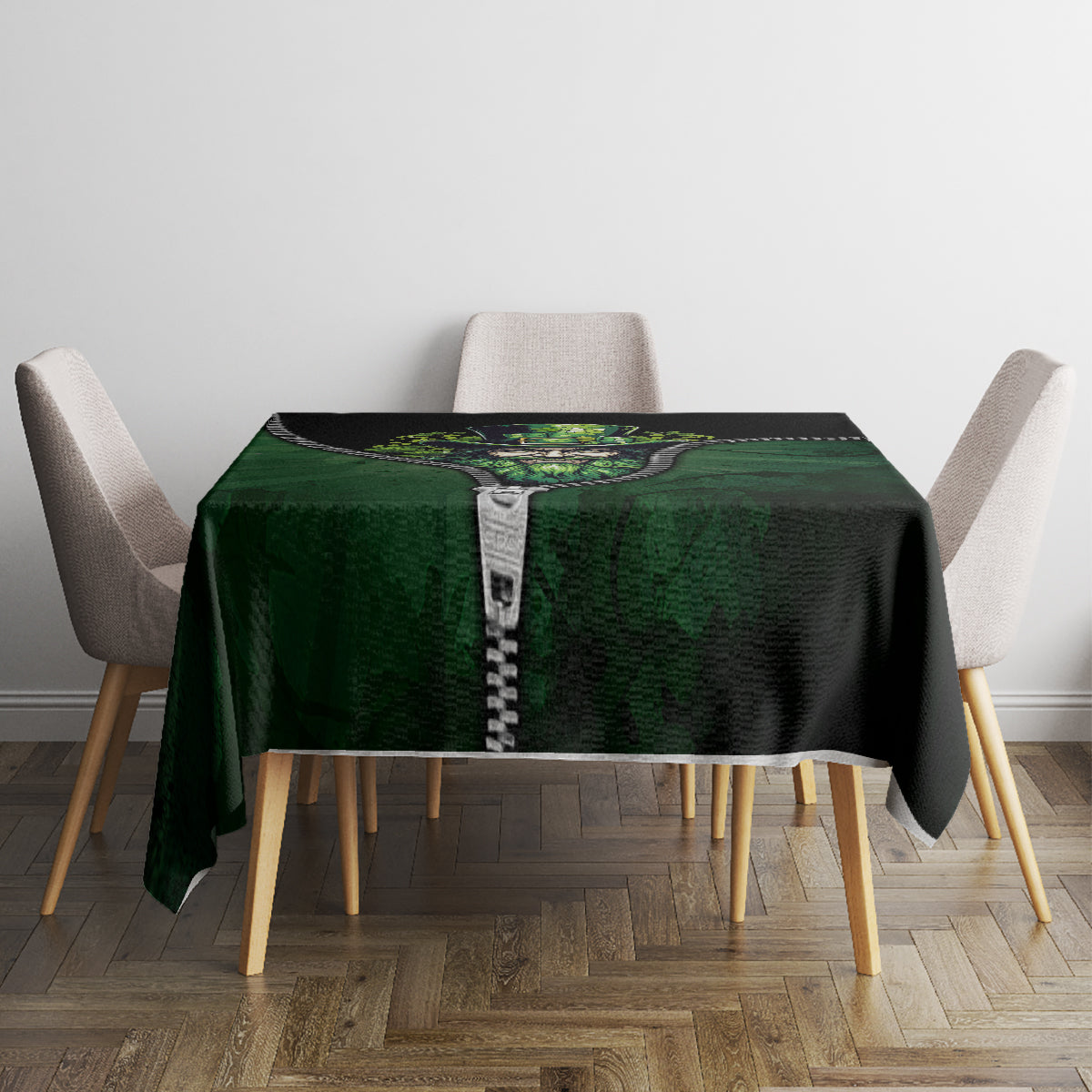 Green and black 3D zip-art tablecloth on a square table with zipper-style graphic in center.