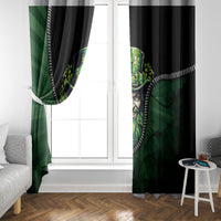 Green and black curtain pair with leprechaun center graphic and white zip border