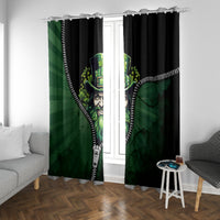 Green and black window curtain with leprechaun face graphic and white zipper edge
