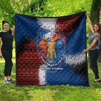 Blue quilt with red patterned strips, elephant illustration, and speckled white watercolor effect