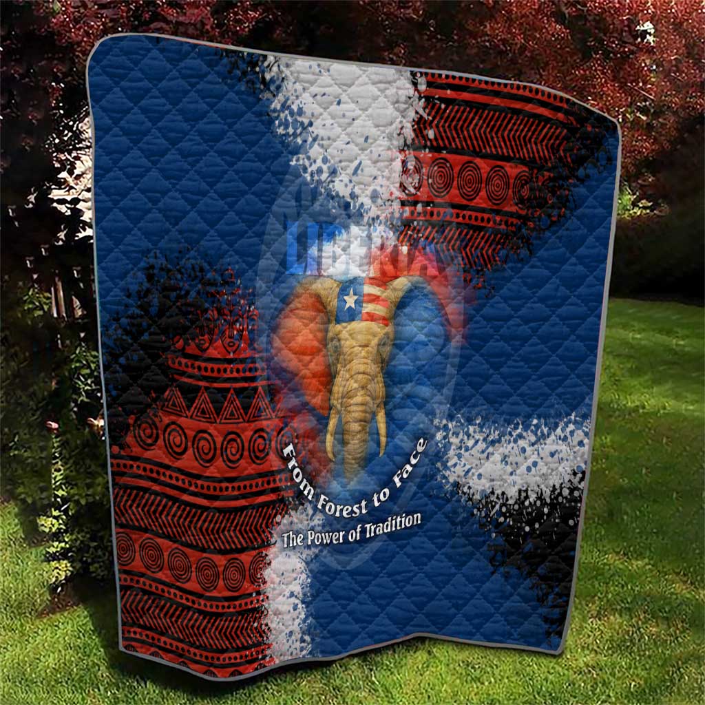 Blue quilt with red geometric banding and elephant figure, diamond-quilted texture