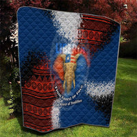 Blue quilt with red geometric banding and elephant figure, diamond-quilted texture