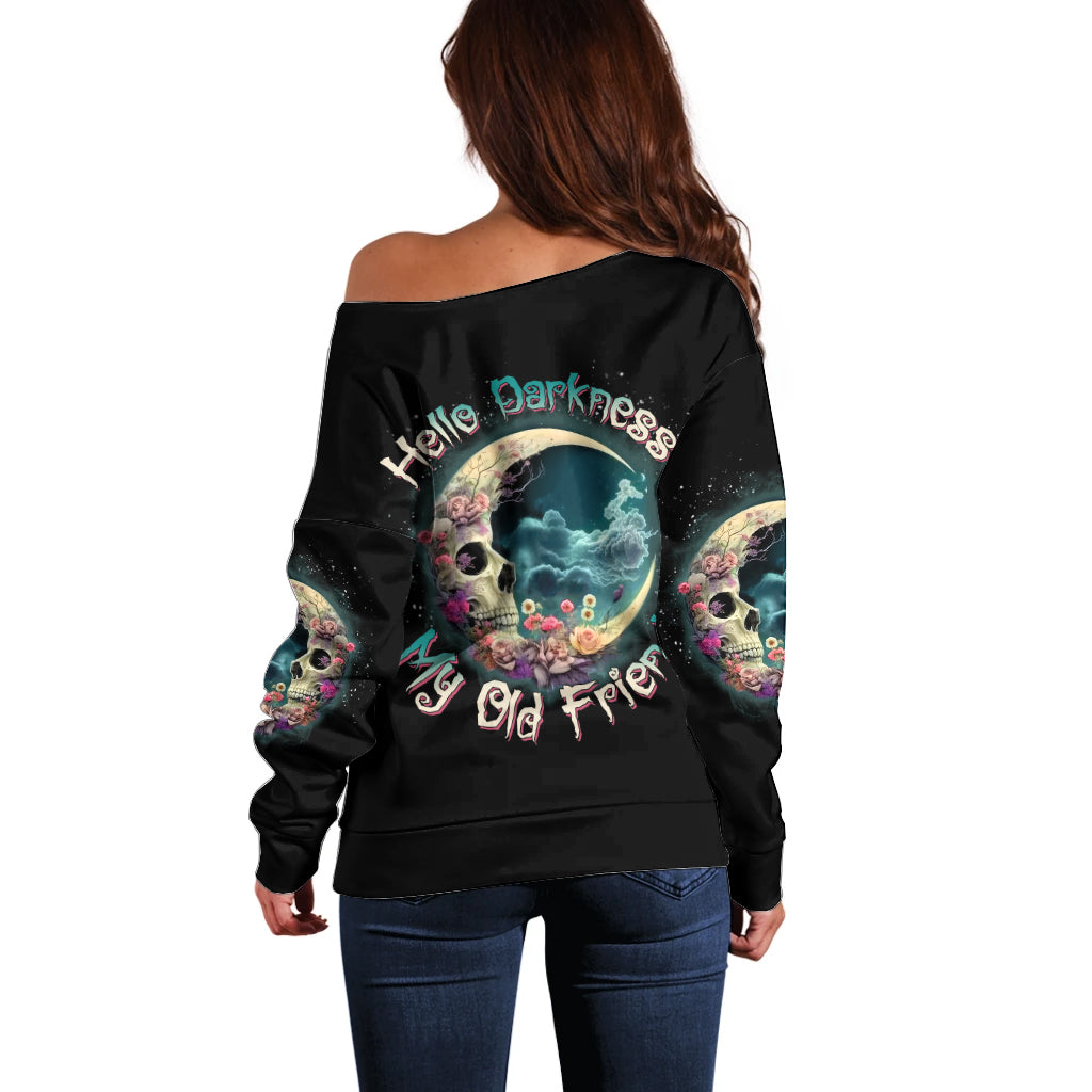 Black off-shoulder sweater with colorful moon skull graphic and long-sleeve back print
