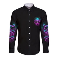 Black long-sleeve button shirt with front pocket graphic and sleeve skull art