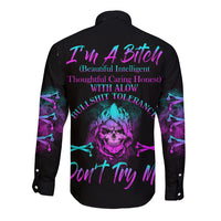 Black long-sleeve button shirt with colorful skull graphic on back