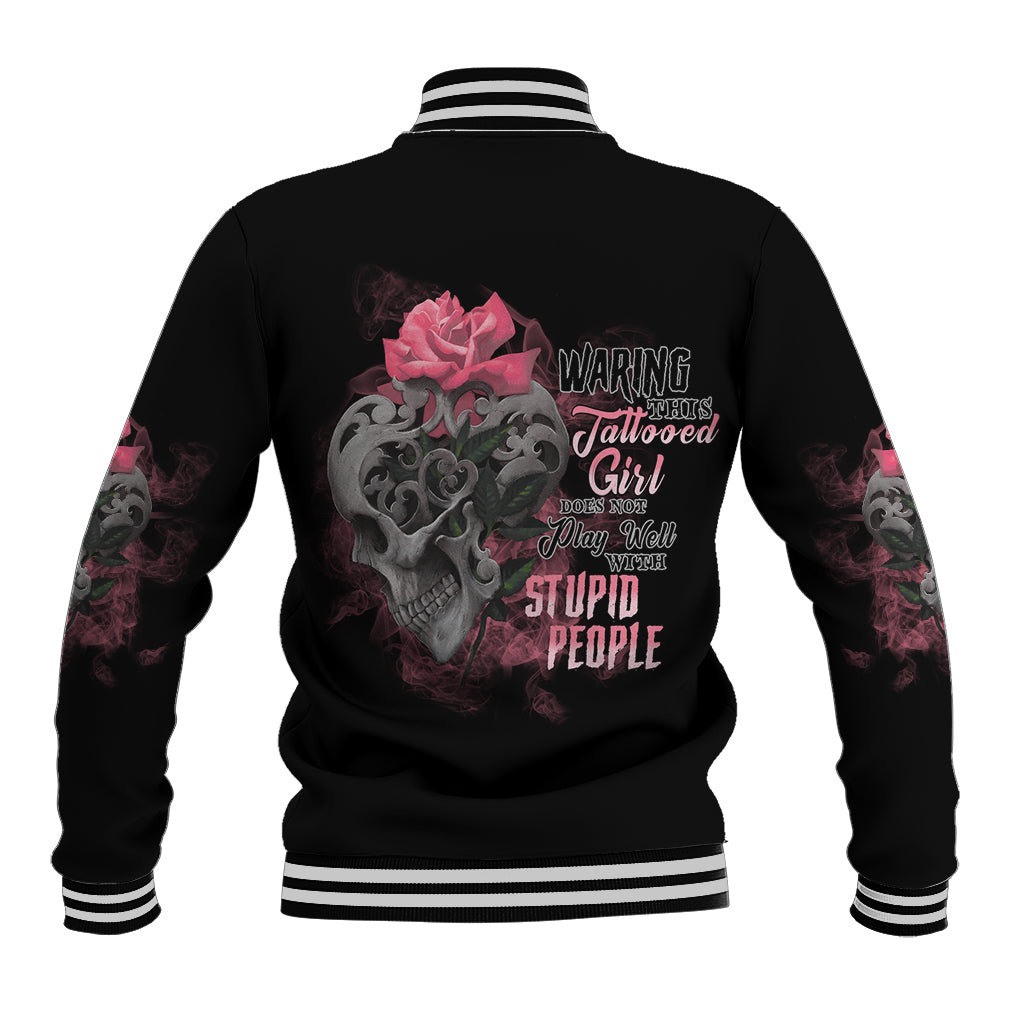 Black baseball jacket with multicolor skull and rose graphic on back, striped ribbed hem & cuffs