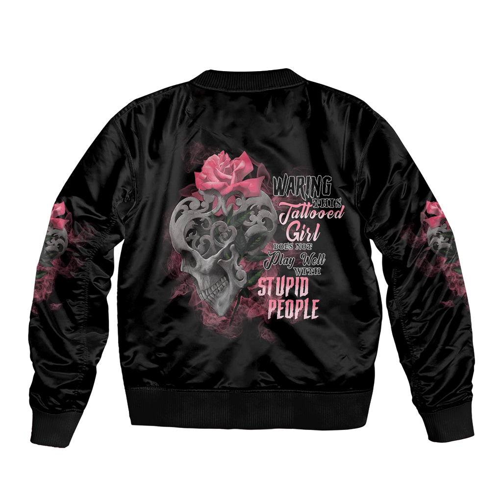 Black satin bomber jacket with back skull graphic and warning lettering, ribbed collar