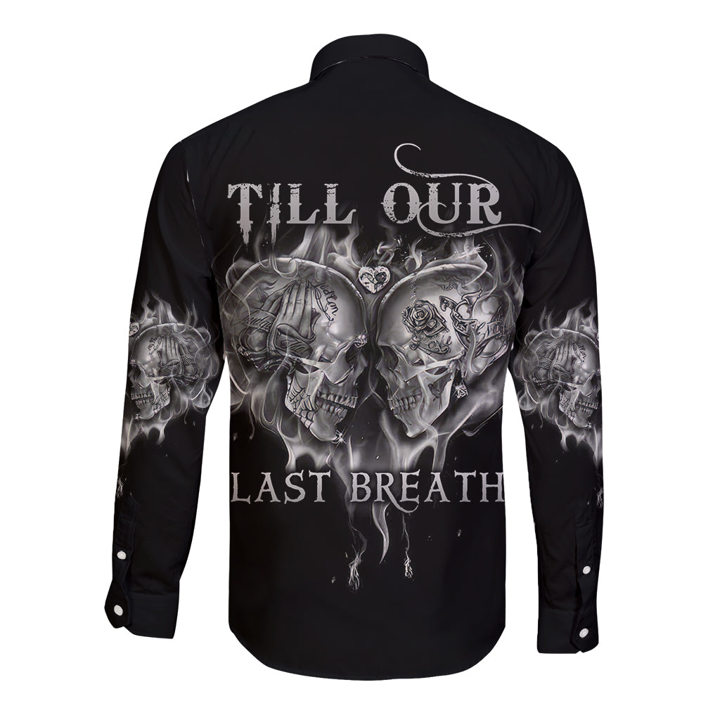 Black long-sleeve button shirt with large back skull-and-heart graphic