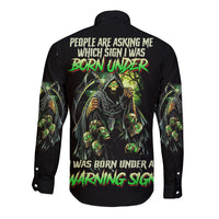 Long sleeve black button shirt with large green reaper skull graphic on back