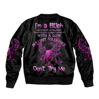 Black unisex bomber jacket with ribbed collar and large purple back graphic
